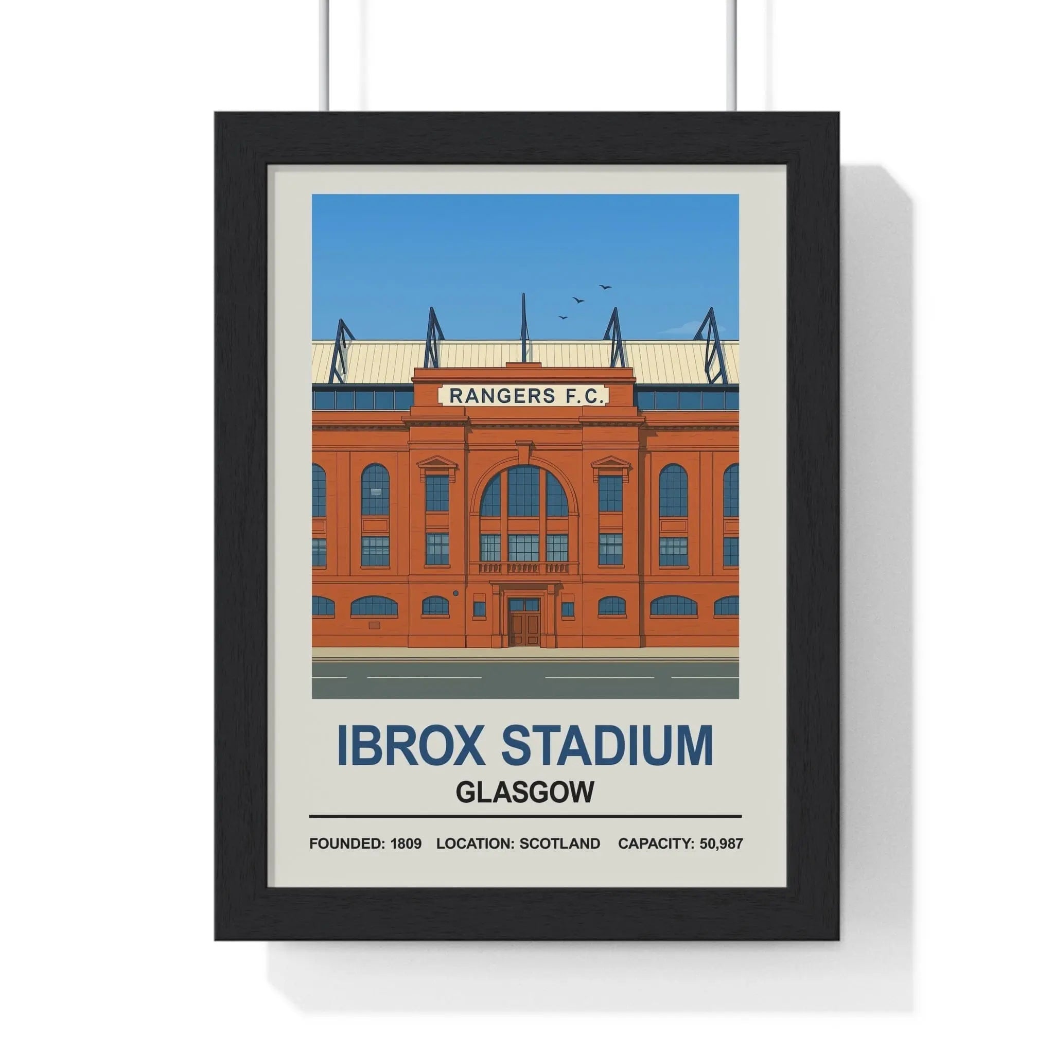 Black-framed stadium print featuring a stylized orange rangers ibrox stadium with blue accents and white text