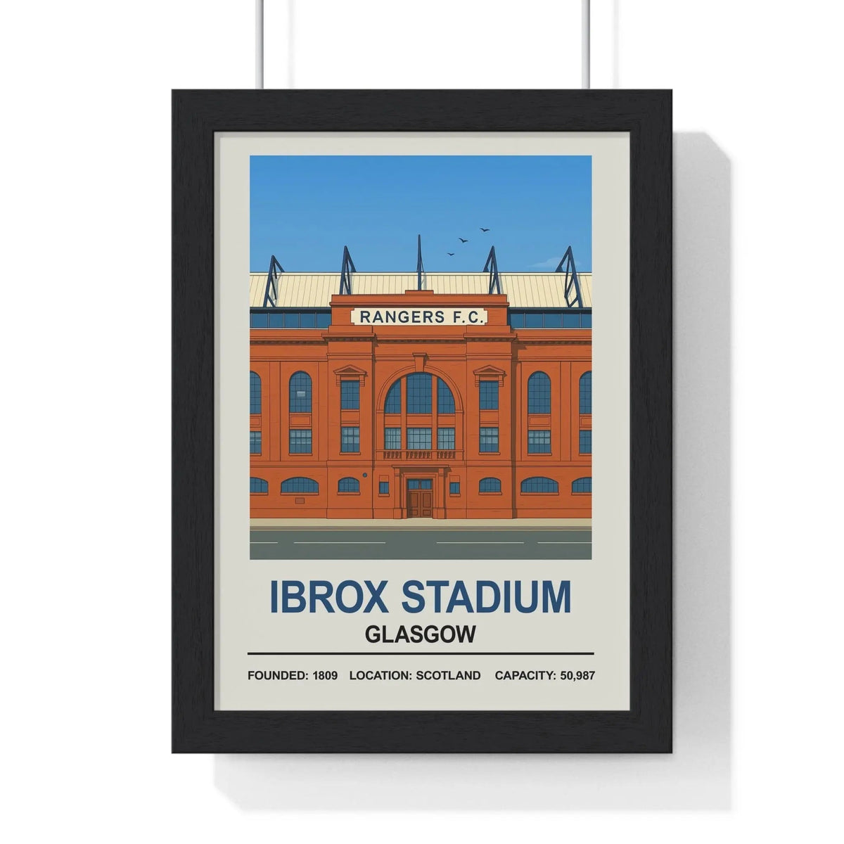 Black-framed stadium print featuring a stylized orange rangers ibrox stadium with blue accents and white text