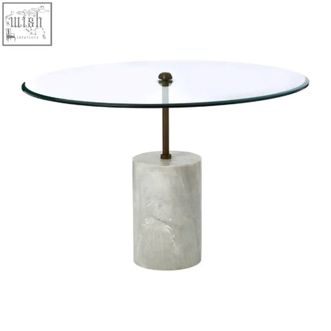 Rany glass and white marble side table with a round glass top, white marble base, and antique brass column