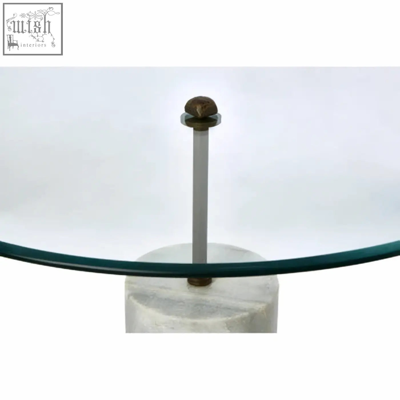 Rany glass and white marble side table with a sleek glass top and elegant white marble base with slender metallic column