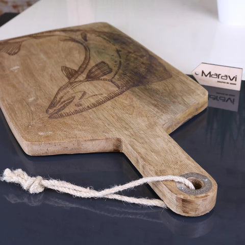 A rustic light brown wooden Rateka lobster fish serving platter board with hand carved design and natural rope handle