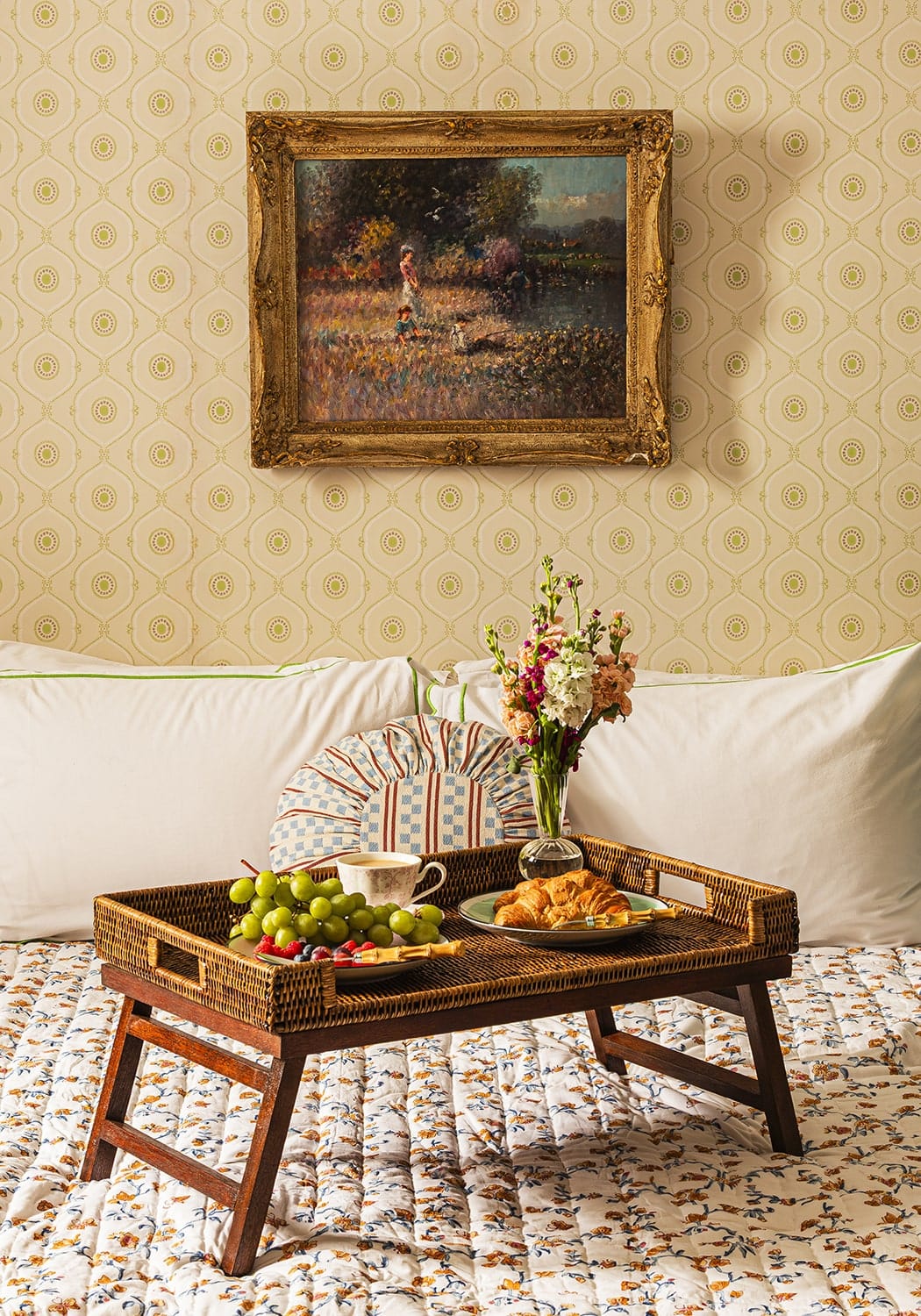 Brown woven rattan breakfast tray with wooden legs featuring a dark brown finish perfect for breakfast tray use