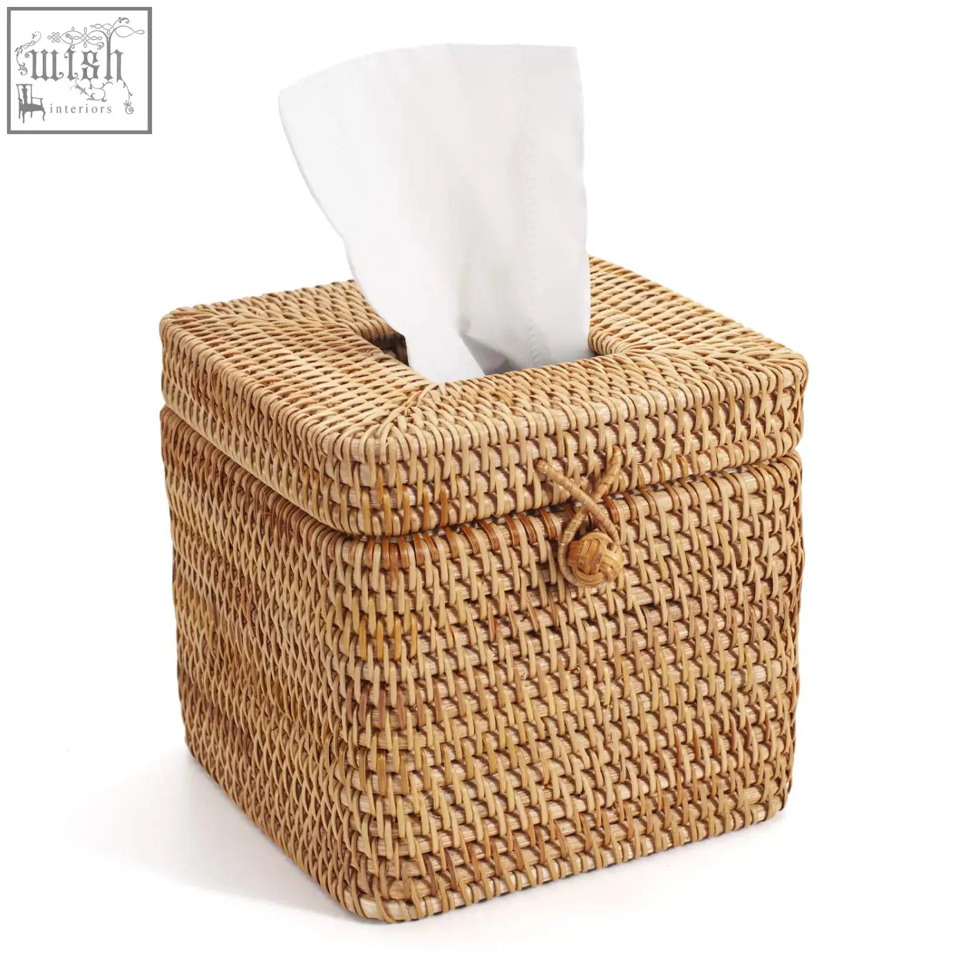 Natural woven rattan square tissue box with tied rope closure and white paper towel partially pulled out
