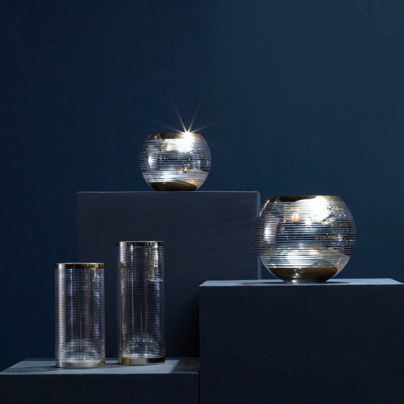 Silver-toned small rounded glass vase with cylindrical and spherical ribbed textured design for decor use