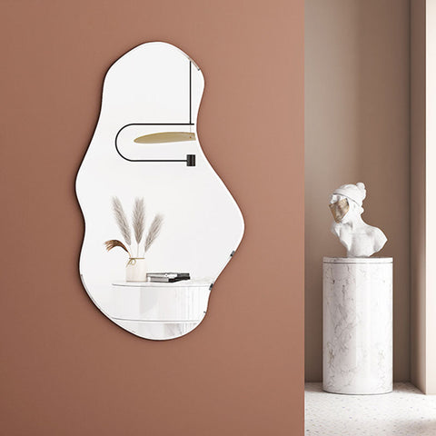 Abstractly shaped minimalist re44 mirror with sleek white frame and reflective surface for modern decor