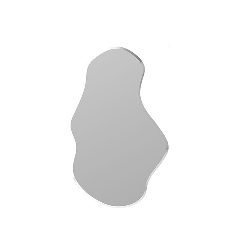 Silver re44 mirror with smooth reflective surface and softly curved abstract edges for stylish home decor