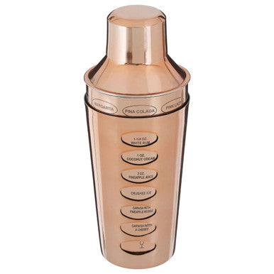 Rose gold cocktail shaker with engraved measurement markings and brand name perfect for mixing drinks