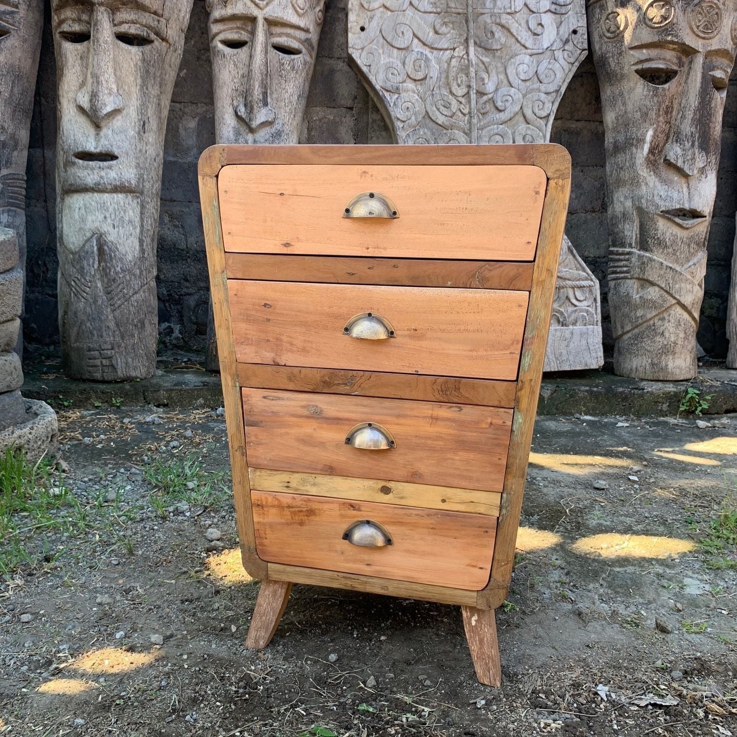 A rustic four-drawer chest made of recycled teak wood with light weathered fronts and metal handles, 52x43x77cm
