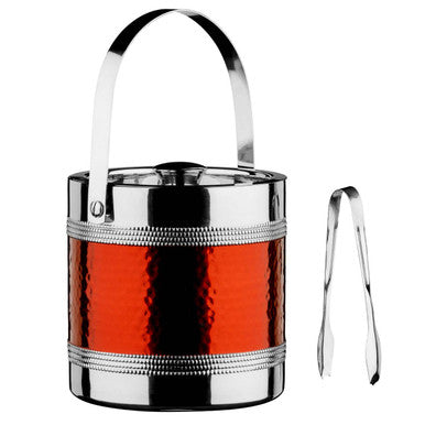 Red ice bucket made of hammered metal with silver rim and handle plus matching tongs for easy ice serving
