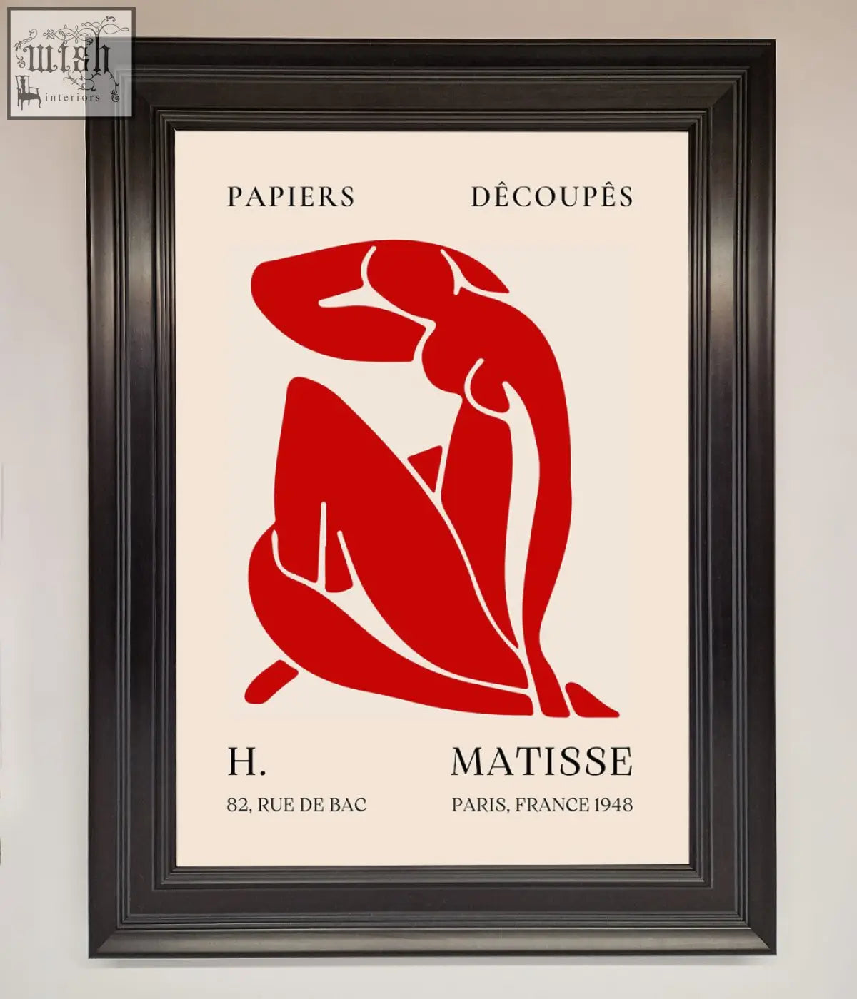 A framed print of a bold red matisse man silhouette with papiers découpés text on off-white background