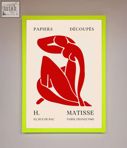 A vibrant lime green framed print of a bold red matisse man silhouette titled papiers decoupes by h
