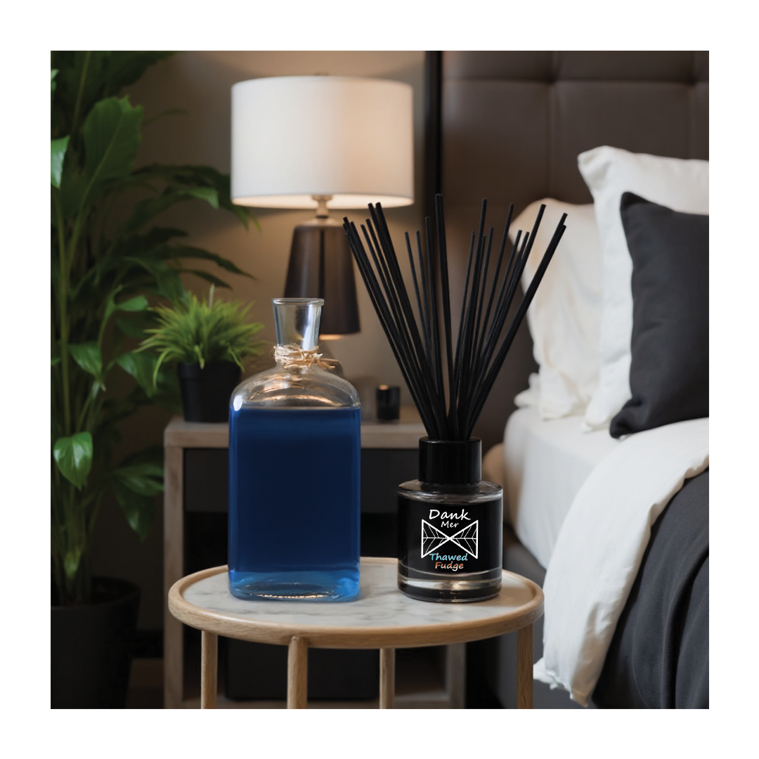 Black reed diffuser set with sleek glass bottle and minimalist label perfect for subtle home fragrance