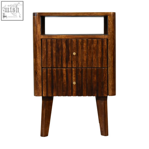 Dark brown reeve bedside table with vertical ridged drawer fronts and round brass knobs made of solid mango wood