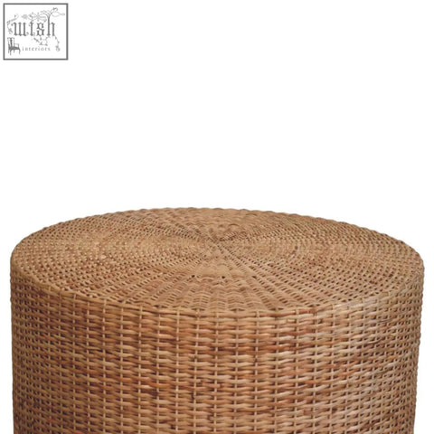 Regency round woven coffee table with natural woven rattan exterior in warm tan featuring textured interlaced pattern