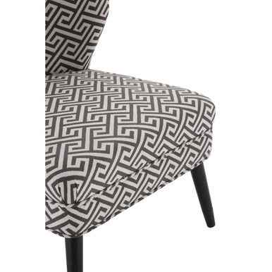 A modern regents park greek key design accent chair with black and white geometric fabric and sleek black legs