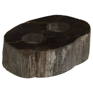 Dark rustic relic petrified wood tealight holder with two circular indentations and rough hewn edges