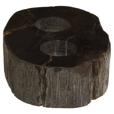 Dark rustic relic petrified wood tealight holder with two circular cutouts and natural textured surface