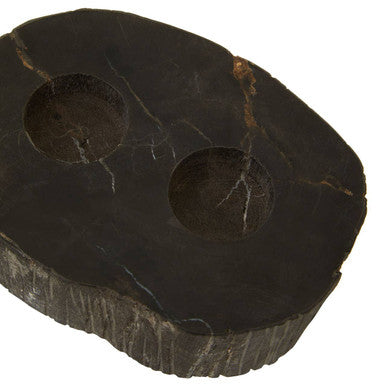 Dark relic petrified wood tealight holder with two circular indentations and natural veining texture