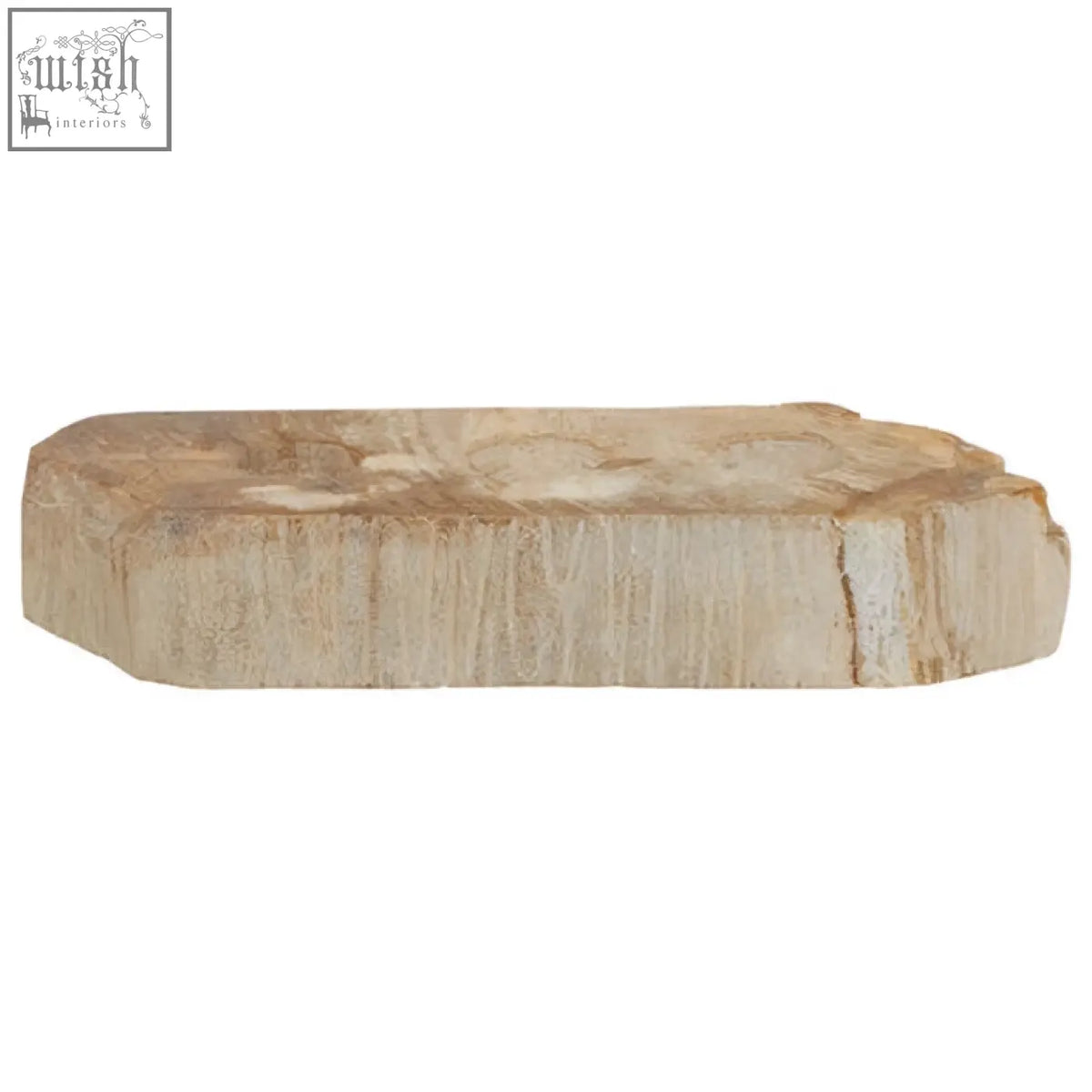 A relic petrified wood tealight holder made from a light beige polished slab with natural striations
