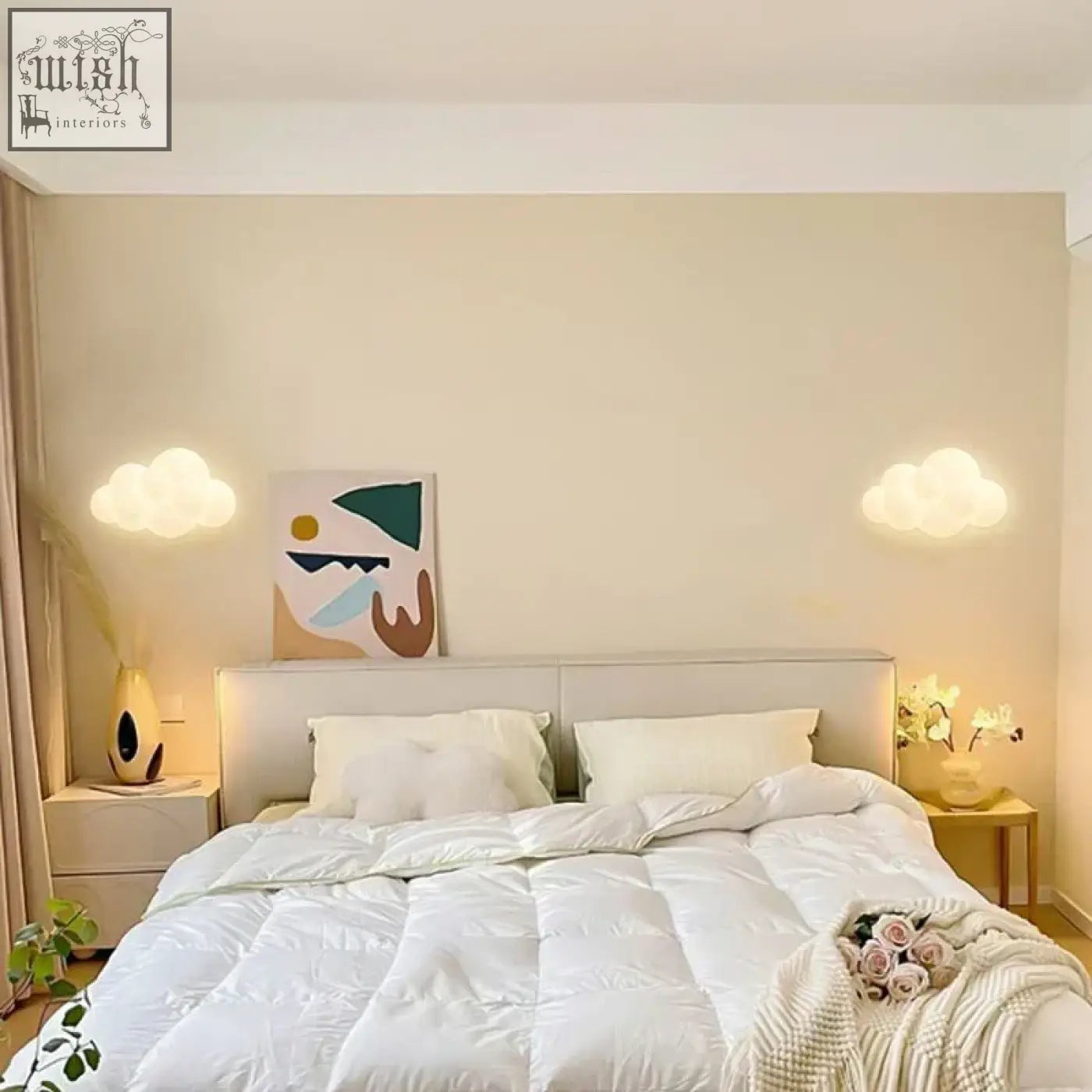 White quilted comforter with plush texture shown with remote control cloud wall lamp featuring adjustable light temperature