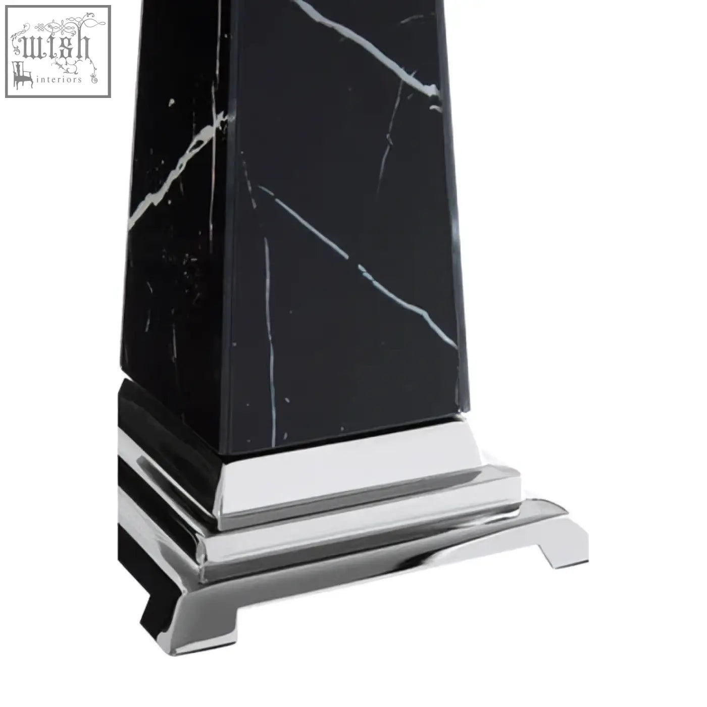 Renata small black marble design obelisk sculpture with white veining on a polished chrome base