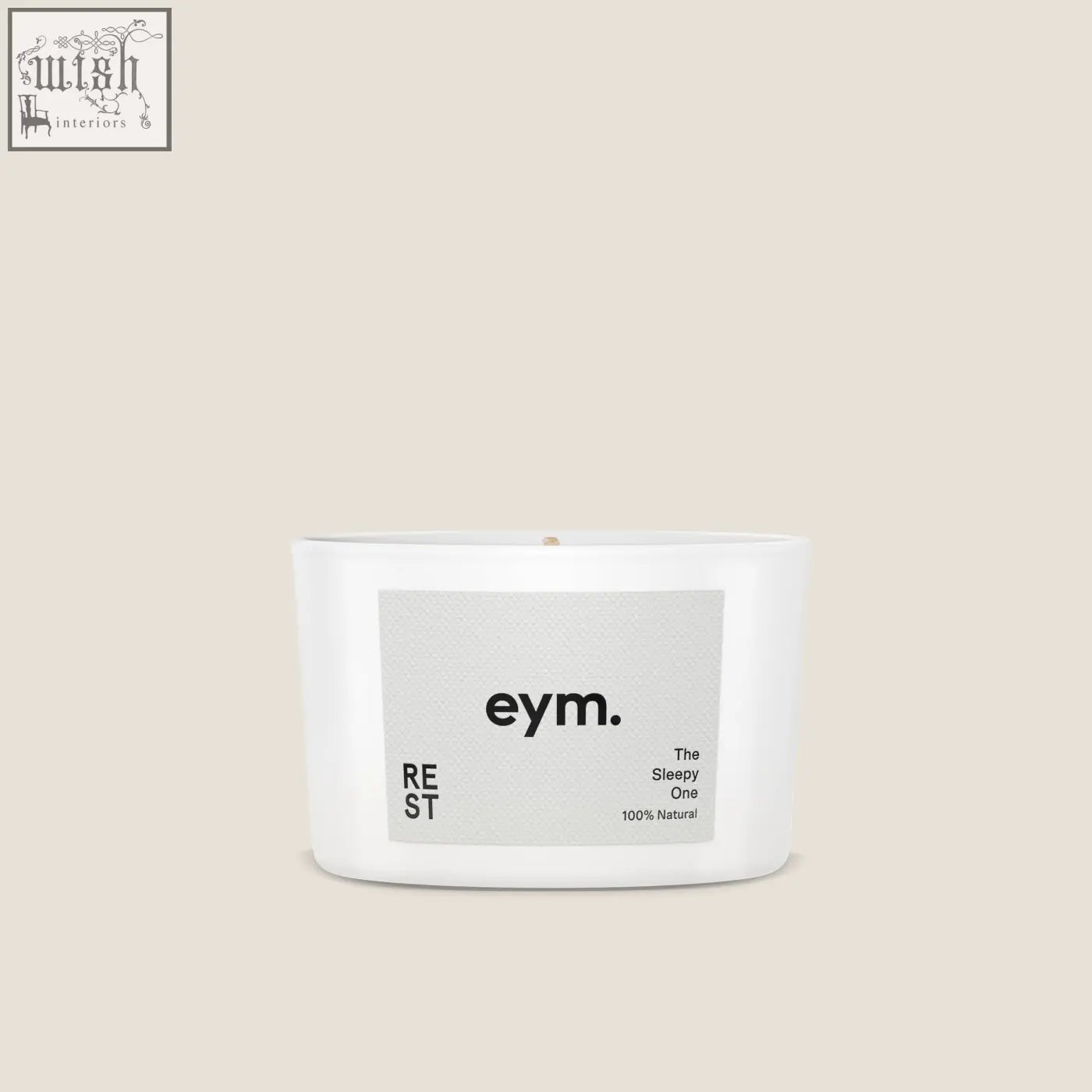 White cylindrical mini candle in minimalist container with gray eym label the sleepy one natural scent for rest