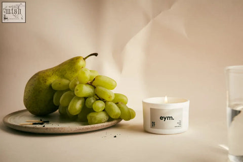 White cylindrical mini candle with minimalist eym label called the peace candle perfect for relaxation and rest