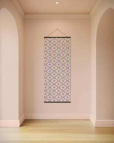 A retro pastel tapestry featuring purple star patterns and wavy lines on a mint green background with black borders