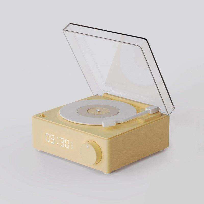 Cream-colored retro vinyl wireless bluetooth speaker with transparent lid digital clock and white vinyl platter
