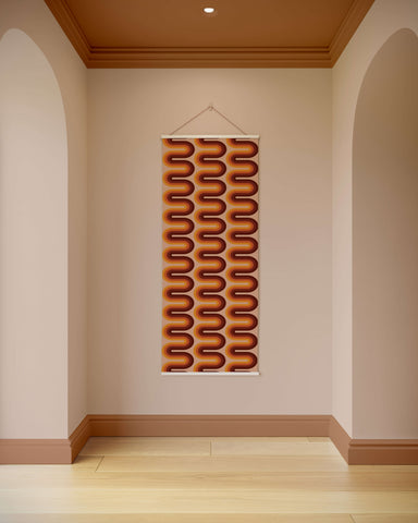 A rectangular retro wiggle stripe tapestry with bold wavy lines in shades of orange and brown for wall decor