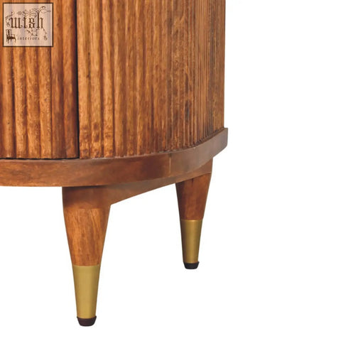 Vintage-style ribbed bedside table with two ribbed-front drawers in solid mango wood amber oak finish and brass accents