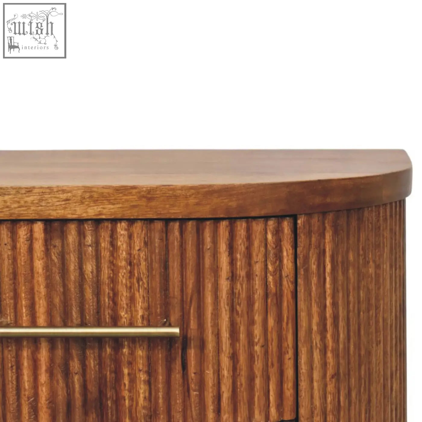 Warm brown ribbed bedside table in solid mango wood with amber oak finish and two ribbed front drawers with brass handles