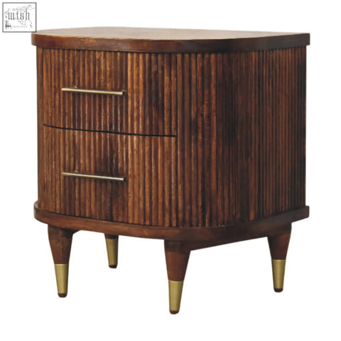 Dark brown wooden ribbed bedside nightstand with vertical slats brass handles and brass-finished legs