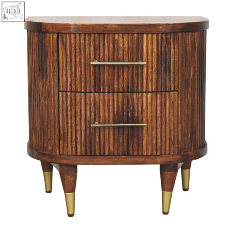 Rustic wood ribbed bedside with vertical slats two drawers brass handles and tapered legs capped in gold