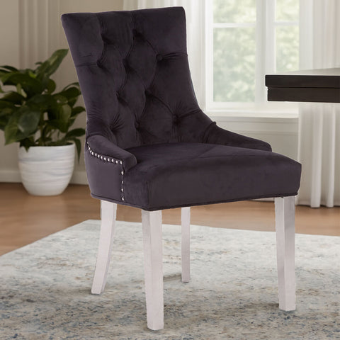 Dark gray richmond black velvet dining chair with tufted back silver nailhead trim and slender white legs