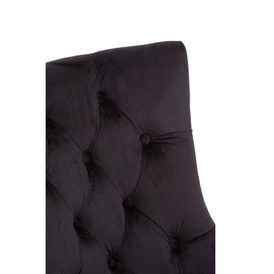 Richmond black velvet dining chair with tufted headboard featuring dark buttons and stitched diamond pattern