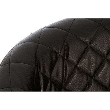 Close up of richy black leather effect accent chair with black quilted leather and diamond stitched pattern