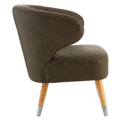 Olive green velvet armchair with quilted upholstery and wood legs paired with brown leather effect accent chair