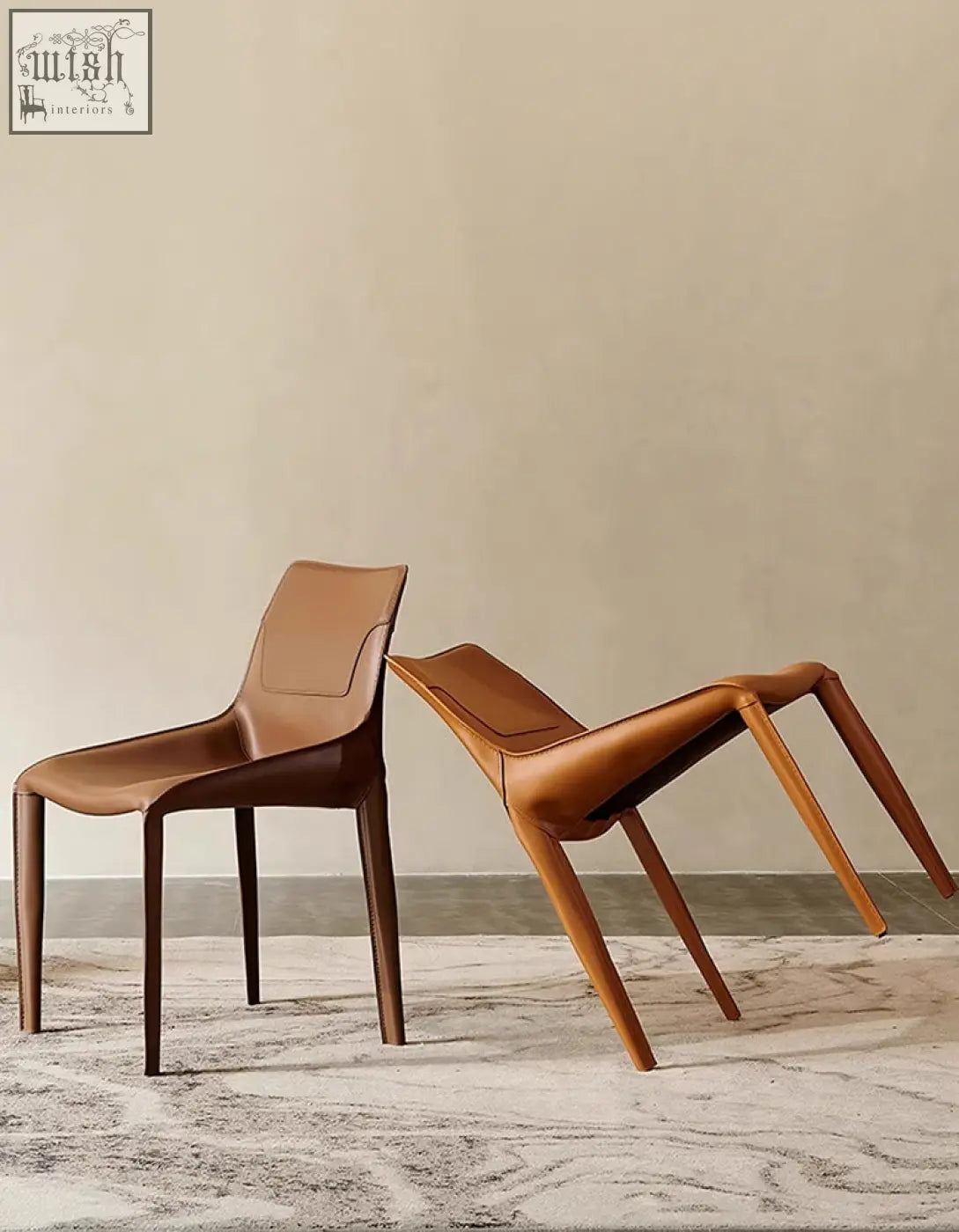 Two minimalist rinaldi modern dining chairs with real leather upholstery and dark brown wooden legs for dining room
