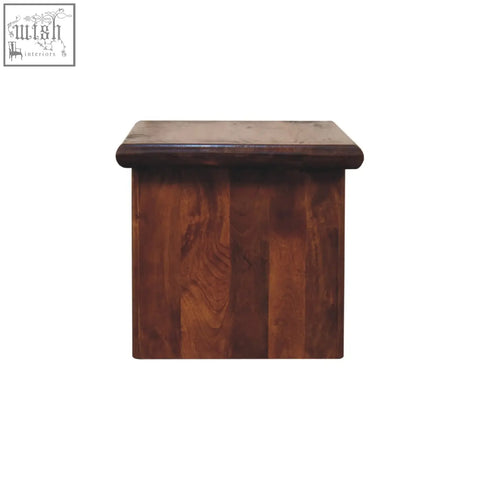 Dark brown rio coffee table end table with smooth rounded top and vertical panels made of solid mango wood chestnut finish