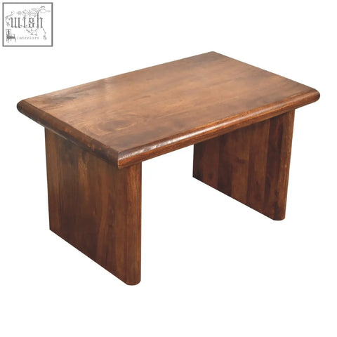 Rectangular rio coffee table in chestnut finish with rounded edges made from solid mango wood