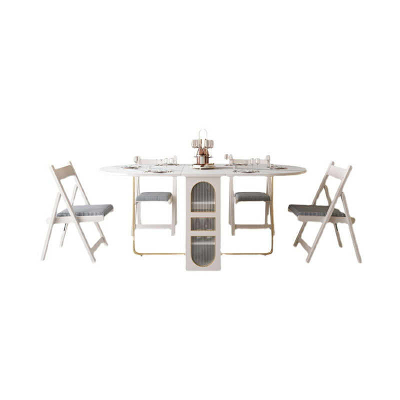 Modern white foldable ritconcept classical dining table set with gold legs and gray cushioned folding chairs