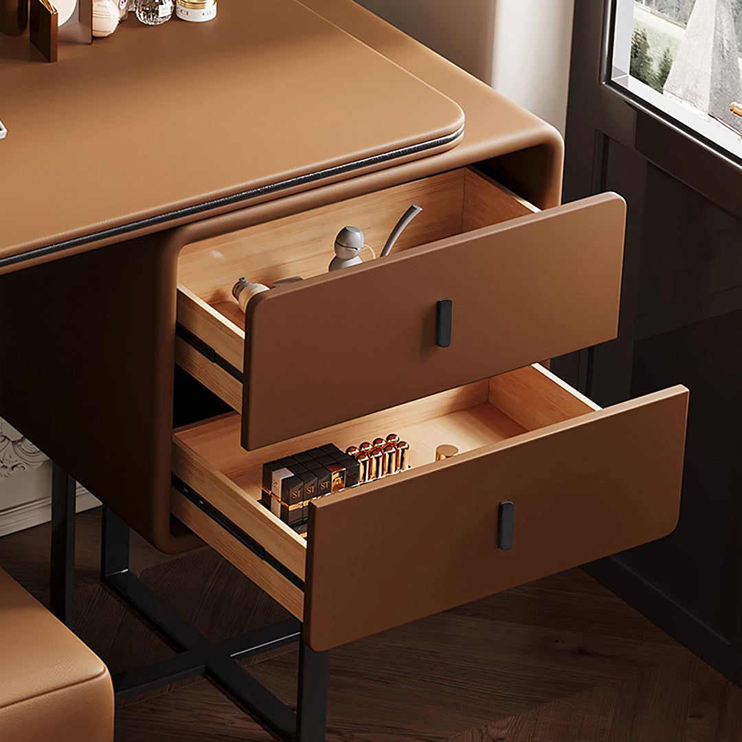 Brown leather rivera dressing table with two open drawers showing wooden interiors and black handles more colours available