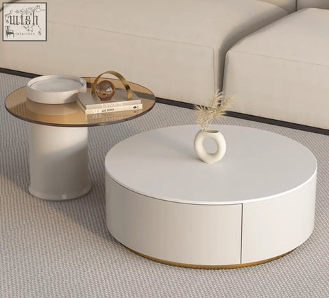 White round riviera round nesting coffee table with gold trim and minimalist design perfect for living rooms