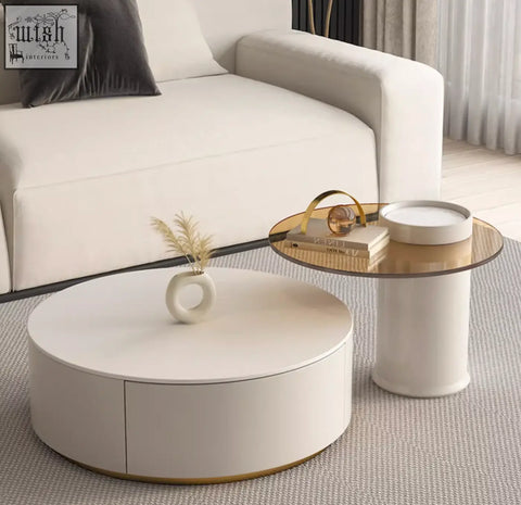White round nesting coffee table from riviera set with sleek minimalist design and gold-trimmed edges