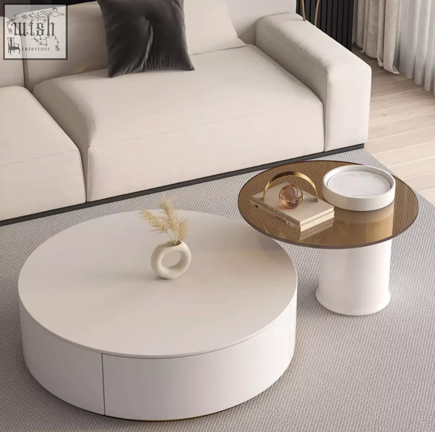 White round nesting coffee table with smooth glossy finish and subtle side drawer from riviera round nesting set