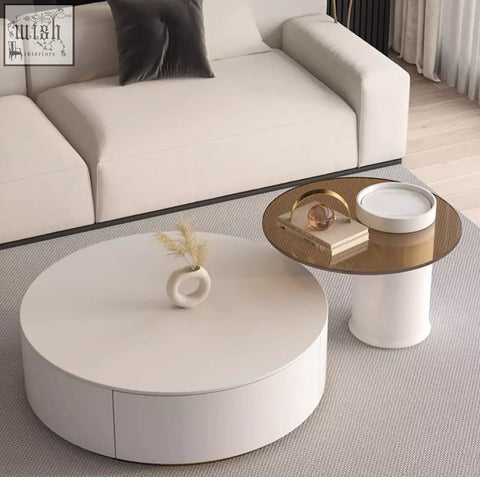 White round nesting coffee table with smooth glossy finish and subtle side drawer from riviera round nesting set