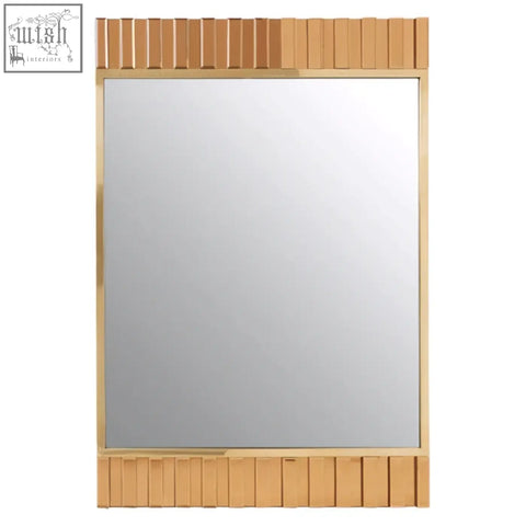 Rivoli wall mirror gold wall mirror with sleek rectangular frame and vertical slats with polished metallic edges