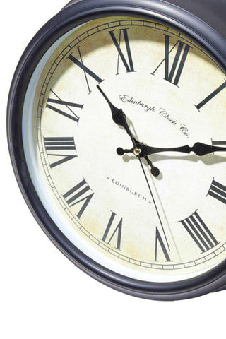Robello black lined rim wall clock with black frame cream face roman numerals and black hands wall clock
