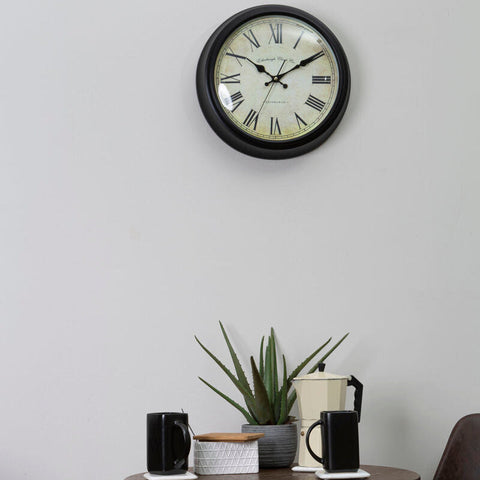 Robello black lined rim wall clock with black-framed round cream face and black roman numerals wall clock